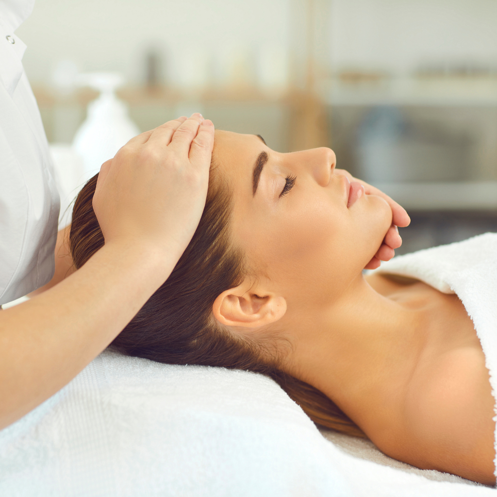 A serene woman receiving a soothing spa treatment with her eyes closed