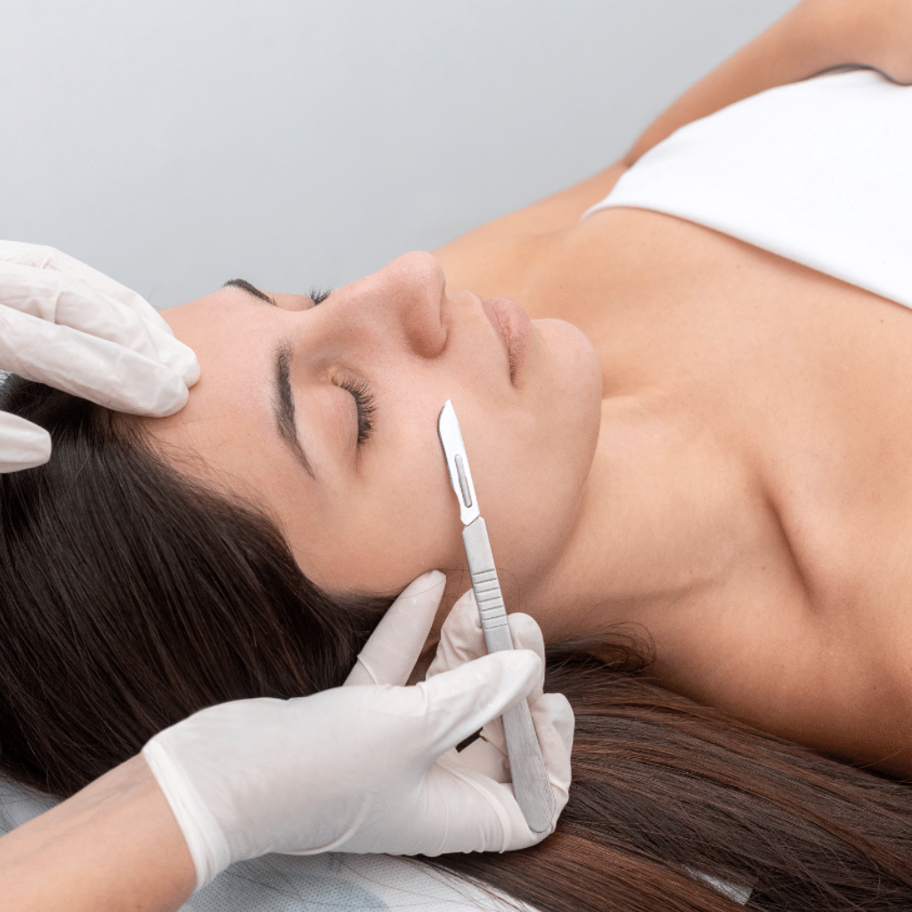 Dermaplane Facial treatment removing dead skin cells and peach fuzz for smoother, brighter skin.